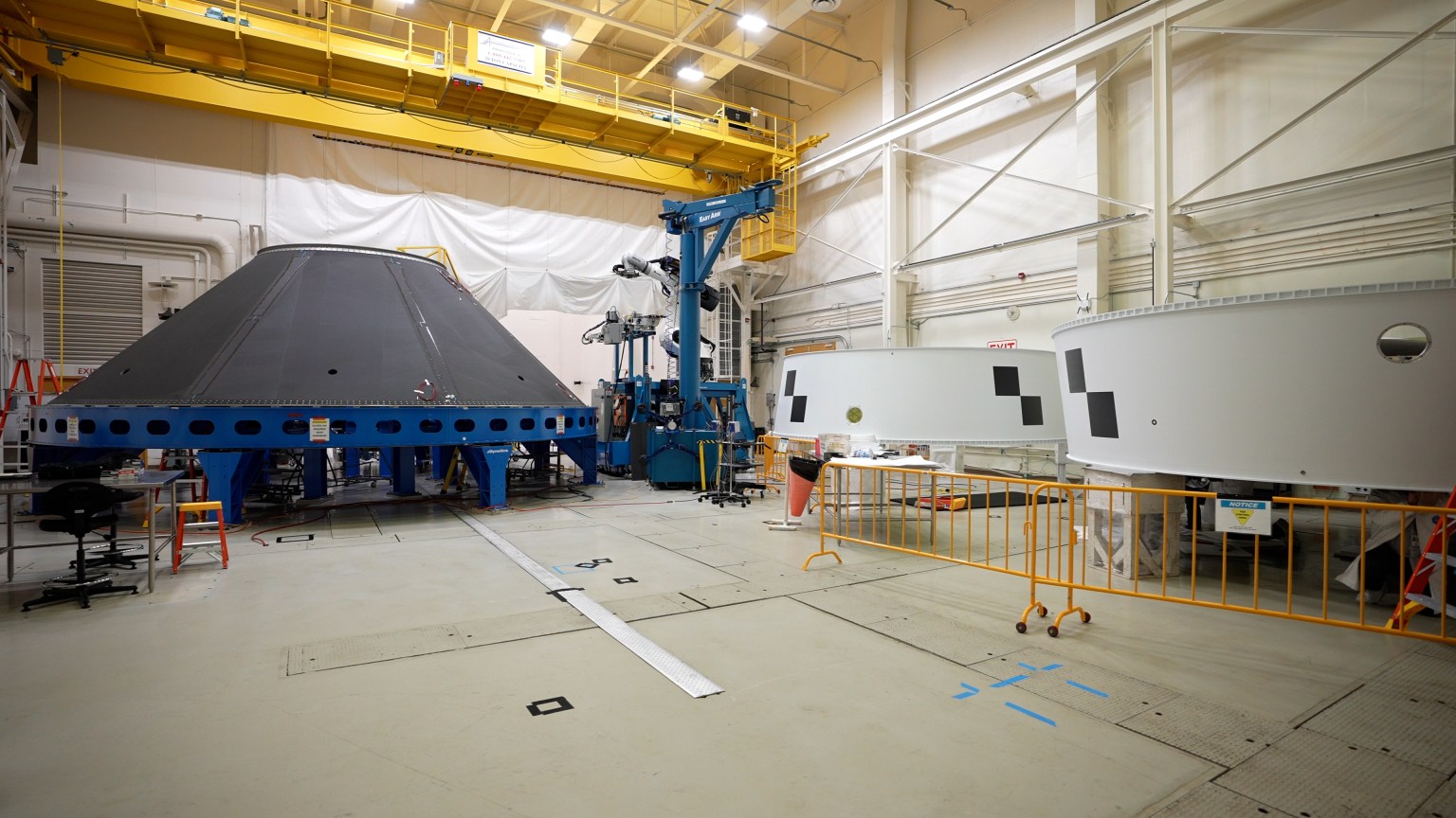 Space Launch System hardware inside an assembly facility at NASA’s Marshall Space Flight Center